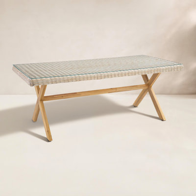 Cascade Rectangular Wicker Dining Table with Solid Wood Legs by Birch Lane